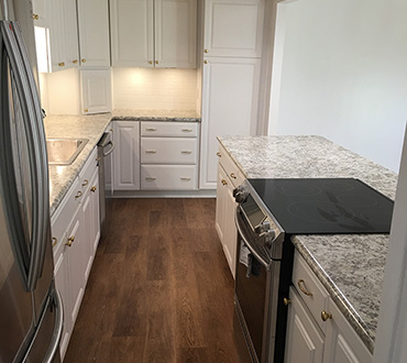 Southern Comfort Home Improvements and Maintenance can update your kitchen with new cabinets, lighting and tile